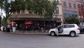 Pan of Downtown Augusta Georgia street view historic vintage buildings people and cars covid delta people outside dining