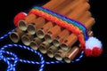 Pan flute on black background Royalty Free Stock Photo