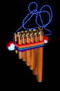 Pan flute on black background Royalty Free Stock Photo