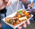 Pan-fried black pork meal in Korea traditional market, delicious korean food cuisine with carrot and shallot green onion, close up Royalty Free Stock Photo