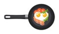 Pan with fried egg in the shape of a heart, with bacon, tomatoes and arugula. Top view. Creative design for breakfast Royalty Free Stock Photo