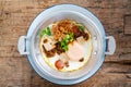 Pan Fried Egg topping with Thai sausage Royalty Free Stock Photo