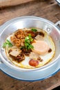 Pan Fried Egg topping with Thai sausage Royalty Free Stock Photo
