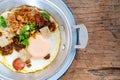 Pan Fried Egg topping with Thai sausage Royalty Free Stock Photo