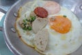 Pan fried egg with toppings