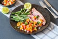 Pan fried gammon with papaya salsa Royalty Free Stock Photo