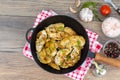 Pan with fried pieces of meat on wooden table Royalty Free Stock Photo