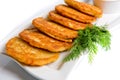 Pan-fried potato pancakes traditional potato fritters on a plate isolated on white background. Royalty Free Stock Photo