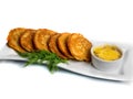 Pan-fried potato pancakes traditional potato fritters on a plate isolated on white background.