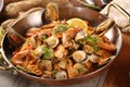 Pan of fried rice with clams, oysters and shrimps Royalty Free Stock Photo