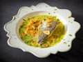 Pan-fried sea trout in green sauce