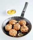 Pan fried tasty German frikadelle with mustard Royalty Free Stock Photo