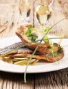 Pan fried trout and baked potato Royalty Free Stock Photo