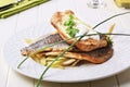 Pan fried trout fillets and baked potato Royalty Free Stock Photo