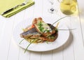 Pan-fried trout fillets with baked potato Royalty Free Stock Photo