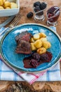 Pan-fried venison with blackberry sauce