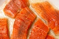 Pan frying red trout fillets, also known as arctic char Royalty Free Stock Photo