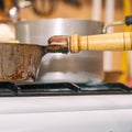Pan on the gas stove close-up. Kitchen utensils Royalty Free Stock Photo