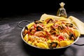 Pan of gourmet paella with shrimp and mussels