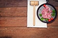 The pan with the meat on the Board. Royalty Free Stock Photo