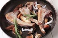 Pan-roasted lamb chops and mushrooms Royalty Free Stock Photo