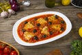 Pan seared fish with tomatoes and olives. Selected focus. Royalty Free Stock Photo