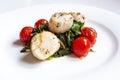 Pan Seared Scallops with Ginger and Black Pepper Served on a Bed of Green Swiss Chard