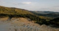 Pan towards left over mud volcanoes and lunar looking landscape