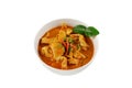 Panaeng Curry with chicken breast in bowl on white background