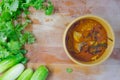 Panaeng curry pork with fresh coriander and cucumber Royalty Free Stock Photo