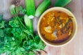 Panaeng curry pork with fresh coriander and cucumber Royalty Free Stock Photo