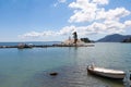 The Panagia Vlacherna Monastery of Panayia with a fisher boat