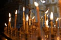 Panakhida, Easter, funeral liturgy in the Orthodox Church. Christians light candles in front of an Orthodox cross with a crucifix Royalty Free Stock Photo