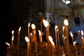 Panakhida, Easter, funeral liturgy in the Orthodox Church. Christians light candles in front of an Orthodox cross with a crucifix Royalty Free Stock Photo