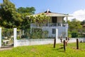 Panama Armuelles, typical renovated wooden house with old external hydrant