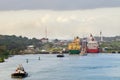 Panama canal, a cargo ship entering the miraflores locks in the Royalty Free Stock Photo