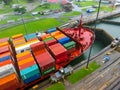 Panama Canal, Panama - December 7, 2019: A cargo ship entering the Miraflores Locks in the Panama Canal Royalty Free Stock Photo