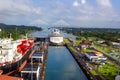 Panama Canal, Panama - December 7, 2019: A cargo ship entering the Miraflores Locks in the Panama Canal Royalty Free Stock Photo