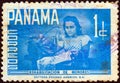 PANAMA - CIRCA 1961: A stamp printed in Panama issued for the youth rehabilitation fund showing a girl using a sewing machine