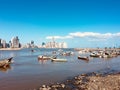 Panama City Cityscape and skyline behind old fisher boats at fish market / harbor - Royalty Free Stock Photo