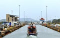 Panama City, Panama - May 9, 2015 - Boat crossing the Panama Canal, an artificial waterway that connects the Atlantic Ocean with