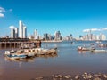 Panama city skyline, skyscrapers and fisher boats at fisher harbour - Royalty Free Stock Photo