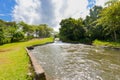 Panama Dolega, artificial waterfall Canal creek, panoramic view on a sunny day