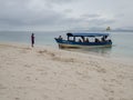 Tourists board small boat at Sanblas Islands
