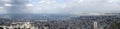 Panaorama of Haifa, Israel with Shower on Skyline