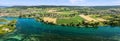 Panaramic aerial image by drone of village and farming land at the blue Rhine river Royalty Free Stock Photo