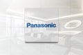 Panasonic on glossy office wall realistic texture