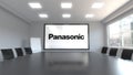 Panasonic Corporation logo on the screen in a meeting room. Editorial 3D animation
