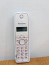 Panasonic white phone table at room