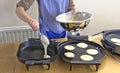Pancake baking in a kitchen Royalty Free Stock Photo